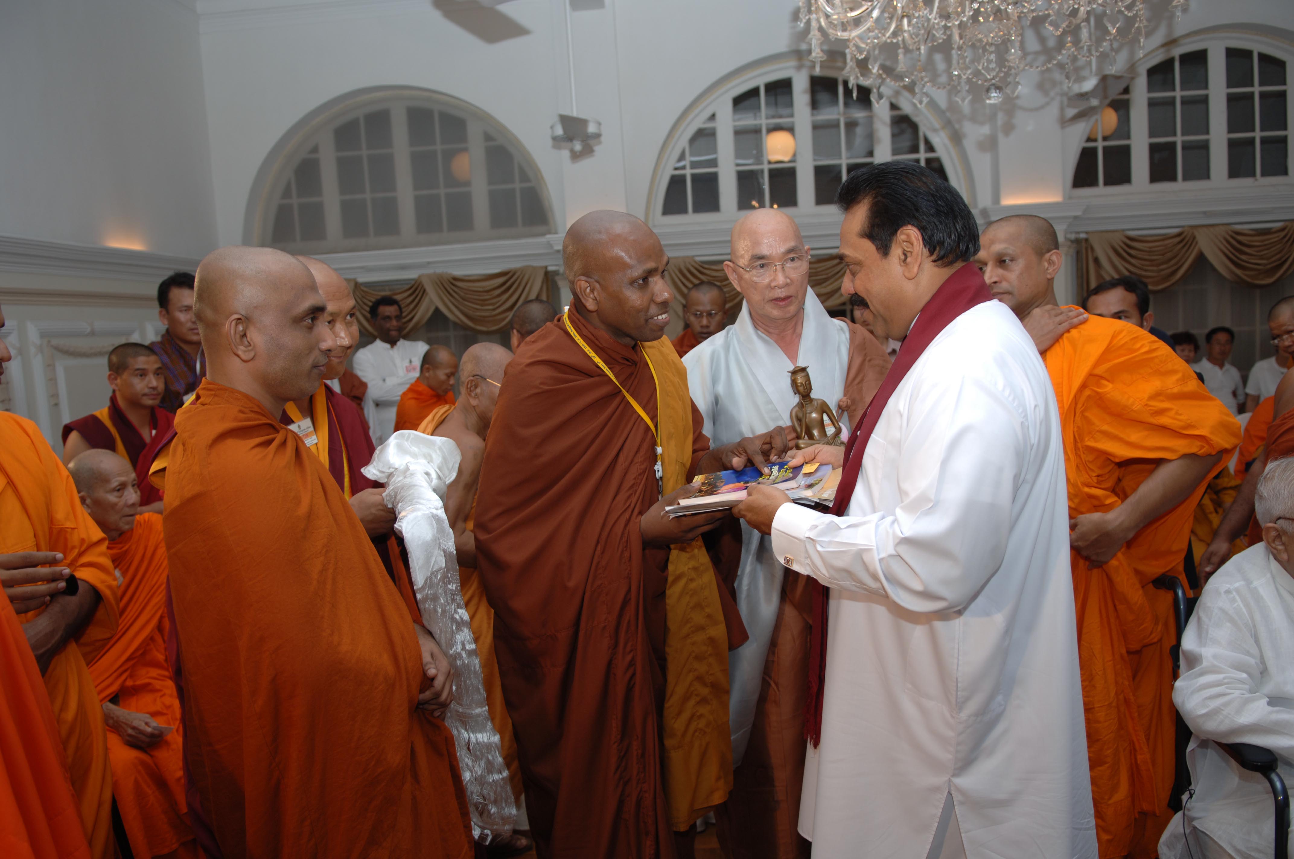 giving my credential book to president at President house on 17.05.2006 vesak day.jpg